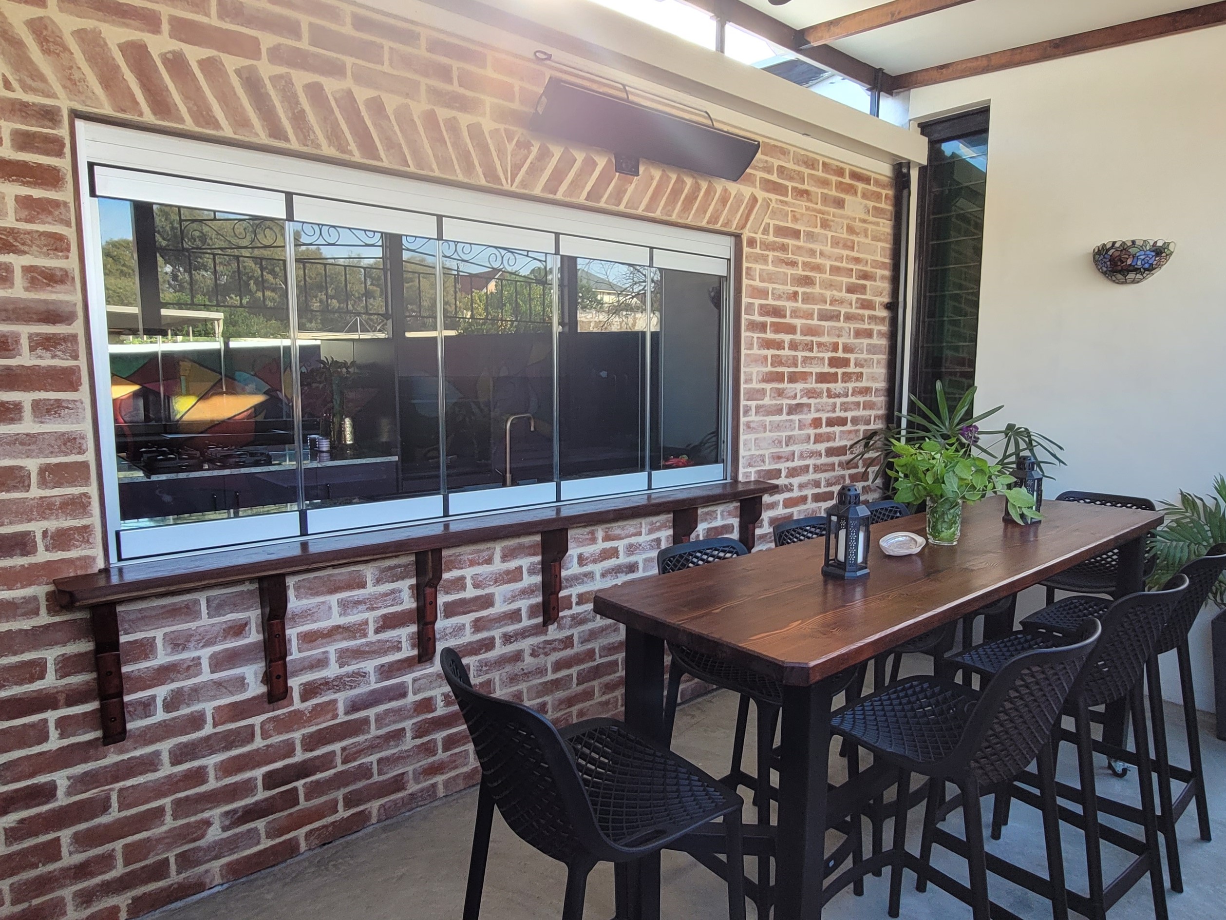 Servery Window into brick wall Servery Window into red brick
