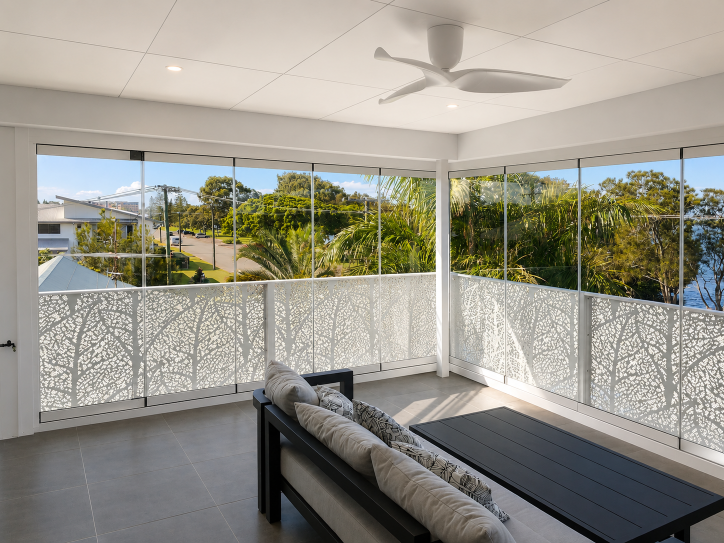 glass weather screened balcony with decorative balustrade